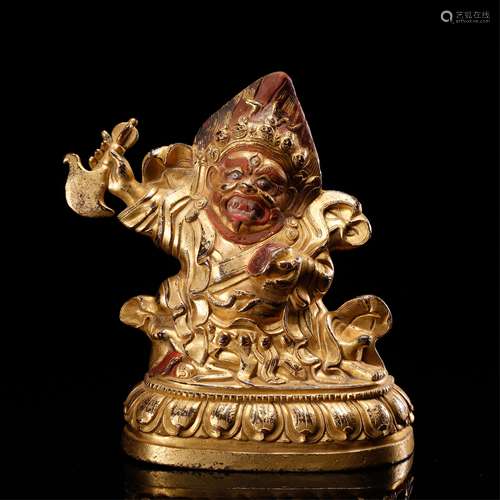 CHINESE GILT BRONZE FIGURE OF JAMBHALA