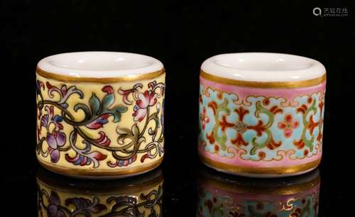 TWO CHINESE FAMILLE ROSE PORCELAIN THUMB RINGS