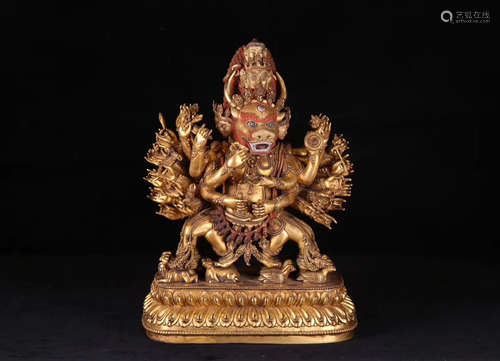 A 18TH CENTURY TIBETAN GILT BRONZE JIN GANG STATUE