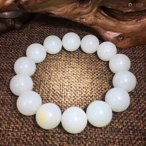 A HETIAN JADE SEED MATERIAL BRACELET