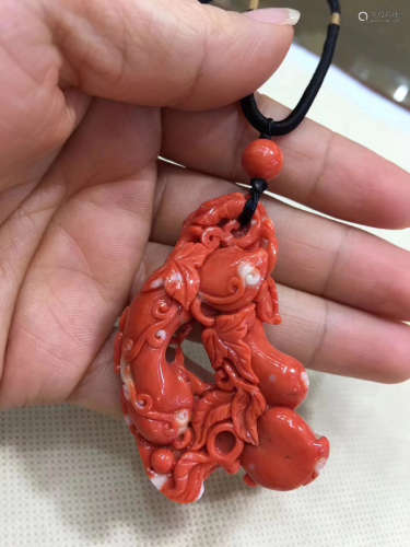 A CARVING PENDANT