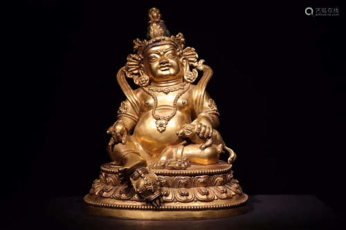 A NINETEENTH CENTURY GILT BUDDHA STATUE