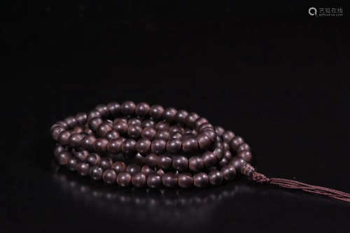 A STRING OF OLD AGALLOCH EAGLEWOOD BUDDHA BEADS