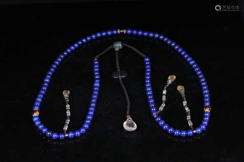 A PALACE LAPIS LAZULI COURT BEADS WITH CRYSTAL