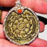 A TIBETAN JIU GONG PENDANT