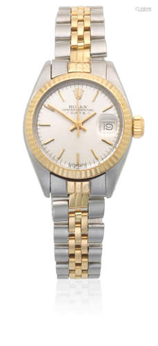 Date, Ref: 6917, Circa 1973  Rolex. A lady's stainless steel and gold automatic calendar bracelet watch