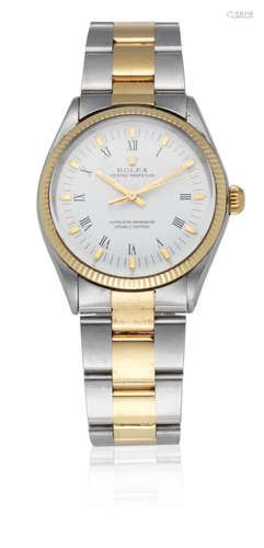 Oyster Perpetual, Ref: 1005, Circa 1972  Rolex. A stainless steel and gold automatic bracelet watch