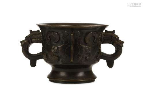 A CHINESE BRONZE INCENSE BURNER, GUI. Qing Dynasty. Of archaistic gui form, cast with a taotie mask