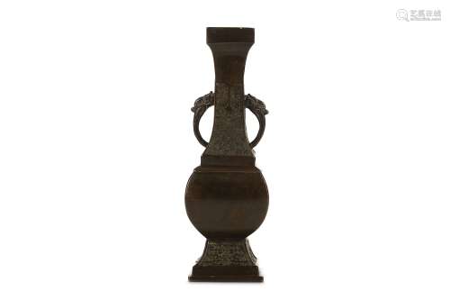 A CHINESE BRONZE VASE, FANGHU. Yuan to Ming Dynasty. The pear-shaped body rising from a splayed
