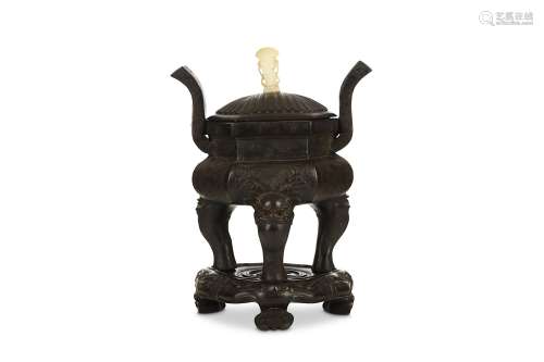 A CHINESE TRIPOD BRONZE INCENSE BURNER. Ming Dynasty. The compressed globular body decorated with