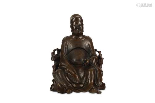 A CHINESE BRONZE MODEL OF WENCHANG WANG. Ming Dynasty. Seated in long flowing robes incised with