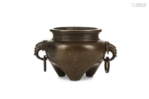 A CHINESE SILVER-INLAID BRONZE INCENSE BURNER. 19th to 20th Century, signed Shisou. Supported on