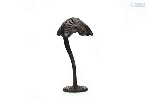 A CHINESE BRONZE ‘BATS’ HAT STAND. Qing Dynasty, 18th Century. Formed as a pierced domed bat,
