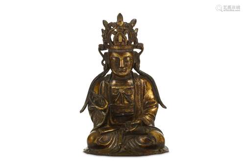A CHINESE GILT BRONZE FIGURE OF GUANYIN. Ming Dynasty, 17th Century. Seated in dhyanasana, dressed