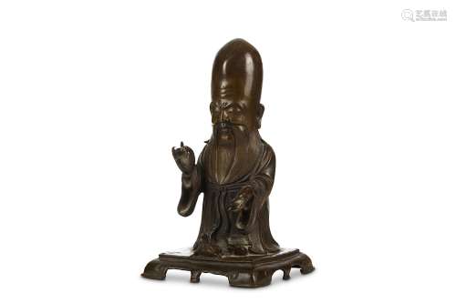 A BRONZE FIGURE OF SHOULAO. Ming Dynasty, or later. The figure standing in long flowing robes, with