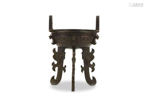 A CHINESE BRONZE INCENSE BURNER, DING. Ming Dynasty. Of archaistic form, the compressed