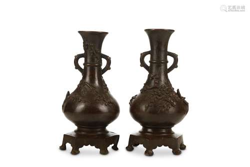 A PAIR OF CHINESE BRONZE ‘PLUM BLOSSOM’ VASES Qing Dynasty, Kangxi era. Cast with a pear-shaped