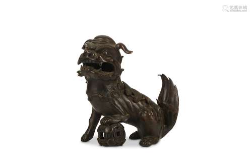 A CHINESE BRONZE ‘LION’ INCENSE BURNER. Ming Dynasty. Naturalistically cast seated with large