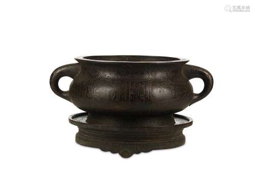 A LARGE CHINESE INCISED BRONZE INCENSE BURNER AND STAND, GUI. Qing Dynasty. Of archaistic gui form,