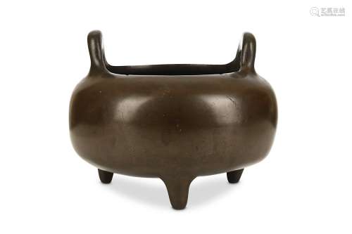 A CHINESE BRONZE TRIPOD INCENSE BURNER. Qing Dynasty. The globular body supported on short, bowed