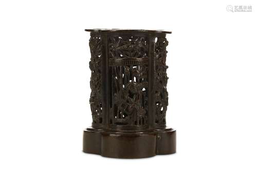 A CHINESE BRONZE INCENSE-STICK HOLDER. Ming Dynasty. Of quadrilobed section with an everted rim,