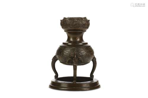A CHINESE TRIPOD BRONZE INCENSE BURNER. Yuan to Ming Dynasty. The globular body decorated with