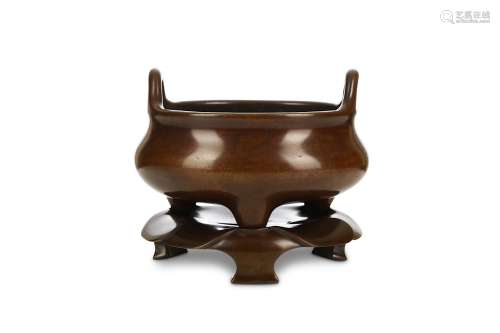 A CHINESE BRONZE INCENSE BURNER, LIDING, AND STAND. Qing Dynasty, 18th Century. Of archaistic