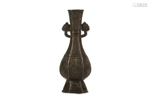 A CHINESE HEXAGONAL BRONZE VASE. Yuan to Ming Dynasty. Of hexagonal form, the pear-shaped body