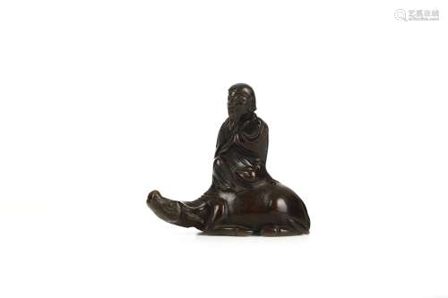 A CHINESE BRONZE ‘LAOZI’ WATER DROPPER. Ming Dynasty. The figure seated in long flowing robes,