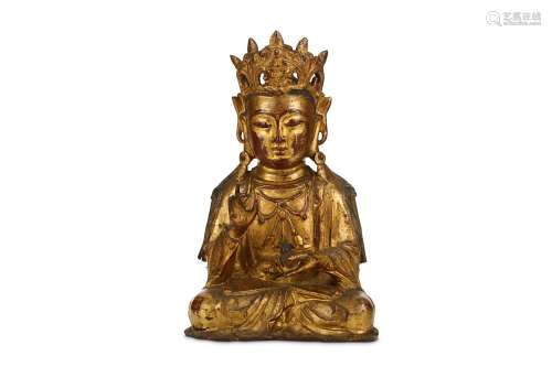A CHINESE GILT-LACQUER BRONZE FIGURE OF GUANYIN. Ming Dynasty, 17th Century. Seated in dhyanasana,