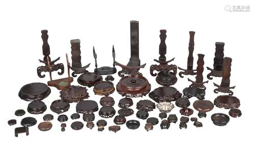 A collection of Chinese stands, 18th-20th century, to include plate and vase stands, fitted