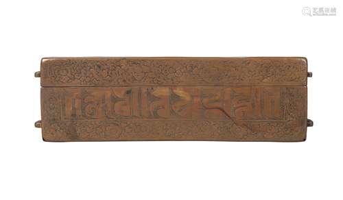 A Tibetan copper alloy rectangular document case, 19th century, inscribed with panel of mantra