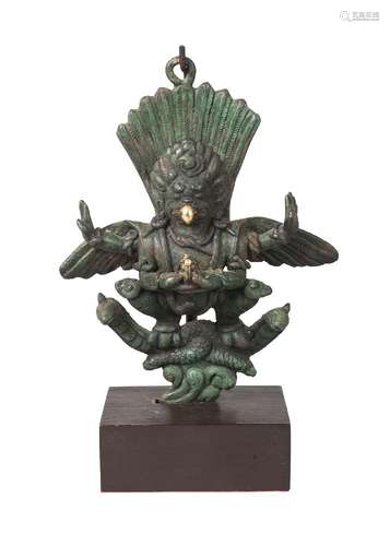 A bronze figure of Garuda, 16th century style, modelled standing on naga, 13.5cm high