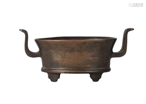 A Chinese bronze oval censer, 20th century, with archaistic handles and feet, apocryphal seal mark