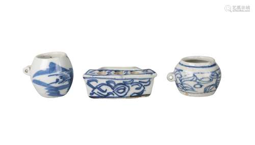 Three Chinese porcelain bird feeders, Qing dynasty, 18th century, each painted in underglaze blue,