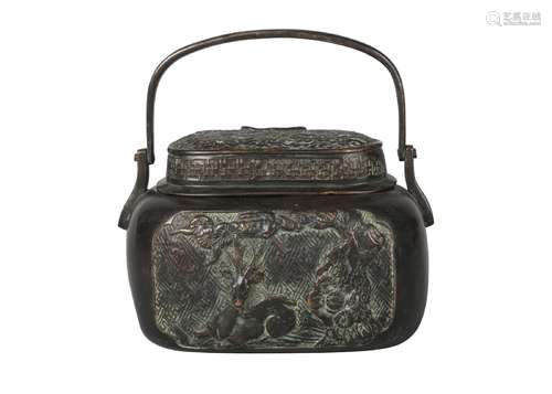 A Chinese bronze incense burner/handwarmer, late Qing dynasty, with swing carry handle and cover