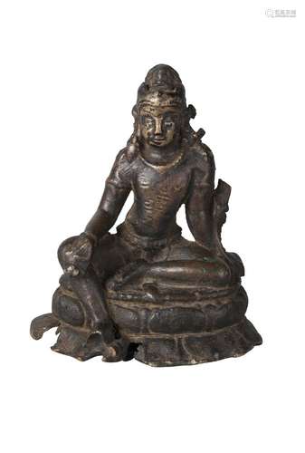 A Nepalese bronze figure of Tara, 12th-13th century, seated in lalitasana, her right hand in