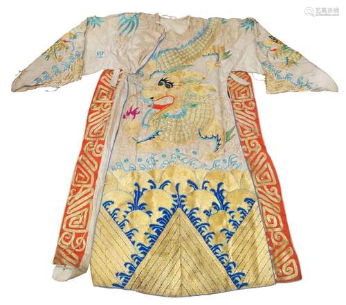 A Chinese silk embroidered dragon robe, early 20th century, embroidered to front and back with a