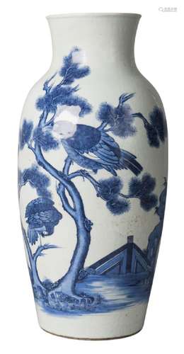 A Chinese porcelain ovoid vase, Qing dynasty, 18th century, painted in underglaze blue with three