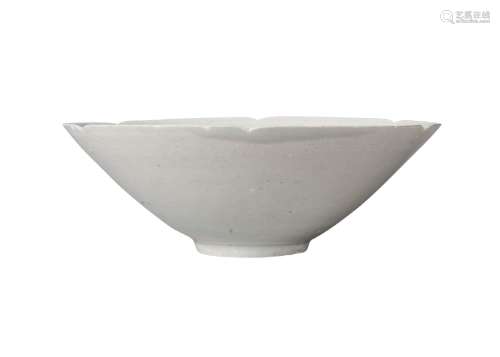 A Chinese porcelain Qingbai glazed bowl, Song dynasty, 12th century, with six-petal moulded rim,