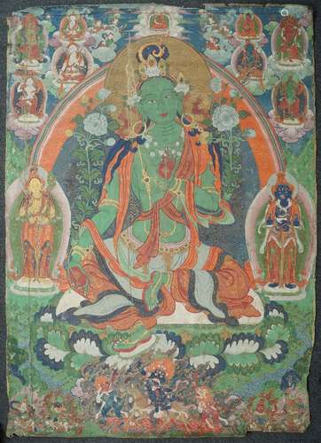 A large Tibetan thangka of Green Tara, 19th century, distemper on cloth, Tara seated in lalitasana