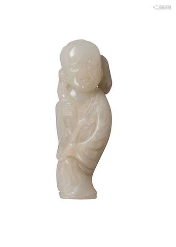 A Chinese pale green jade carving of a boy, late Qing dynasty, carved standing, clutching a