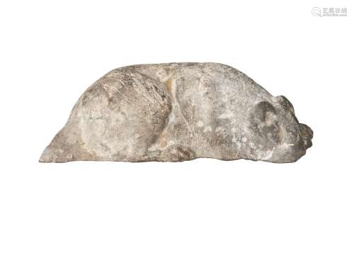 A Chinese grey pottery model of a cat, Han dynasty, modelled curled and sleeping, 13.5cm long