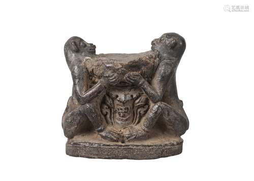 A Nepalese pottery figure group, 18th/19th century, modelled as two monkeys holding a bowl aloft,