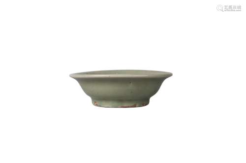 A Chinese Longquan grey stoneware celadon glazed dish, Ming dynasty, 15th century, the central