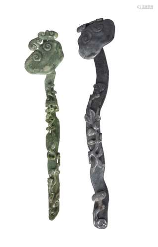 Two Chinese jade 'lingzhi' ruyi-sceptres, late Qing dynasty, one of spinach green tone, carved to