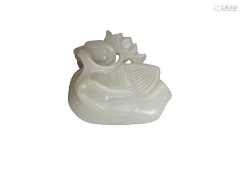 A Chinese Ming-style pale green jade carving of a duck, late Qing Dynasty, carved with a flowering