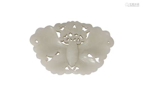 A Chinese pale green jade butterfly plaque, mid-19th century, reticulated, and with wings spread,