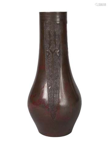 A Chinese bronze vase, late Qing dynasty, decorated with archaistic vertical panels, unmarked,