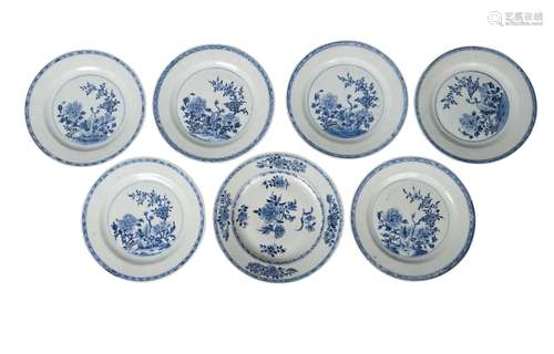 Seven Chinese export porcelain plates, 18th century, each painted in underglaze blue with blossoming